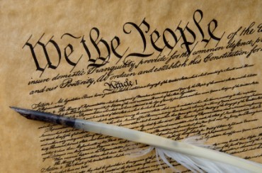 Photo of the Constitution of the United States of America. A feather quill is included in the photo.The Constitution of the United States is the supreme law of the United States of America and is the oldest codified written national constitution still in force. It was completed on September 17, 1787.