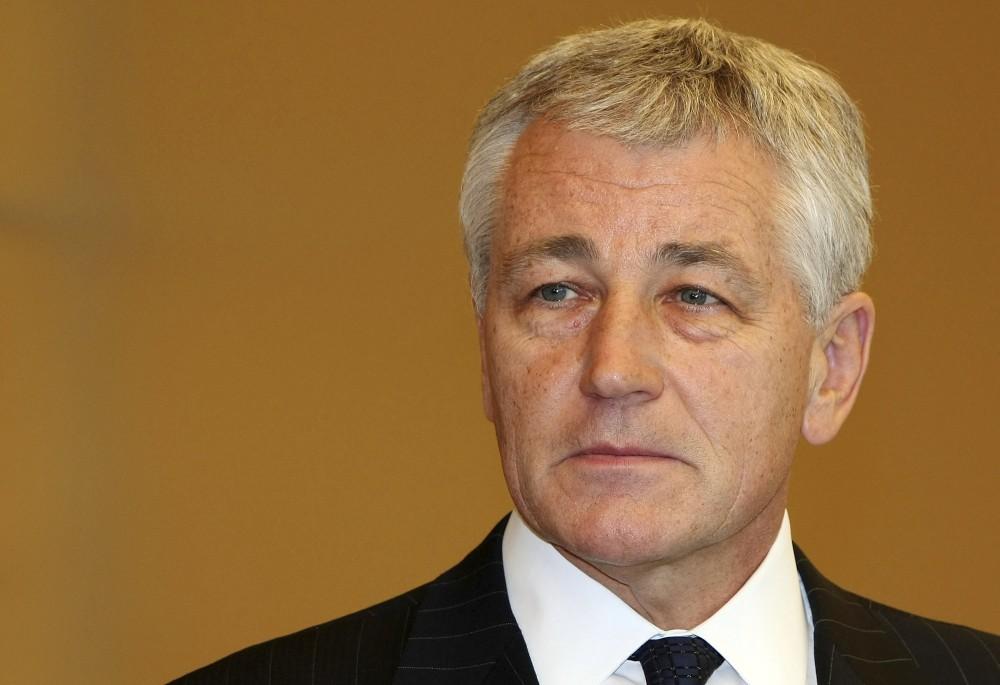 TOKYO - OCTOBER 16:  Senior US Senator Chuck Hagel waits for Japanese Prime Minister Taro Aso at the premiers official residence on October 16, 2008 in Tokyo, Japan. Senator Hagel is making an official visit to meet PM Aso during his 3-day stay in Japan.  (Photo by Junko Kimura/Getty Images)