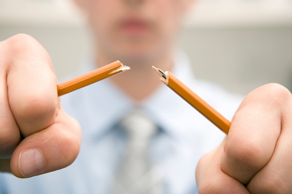 Business Man Breaking Pencil