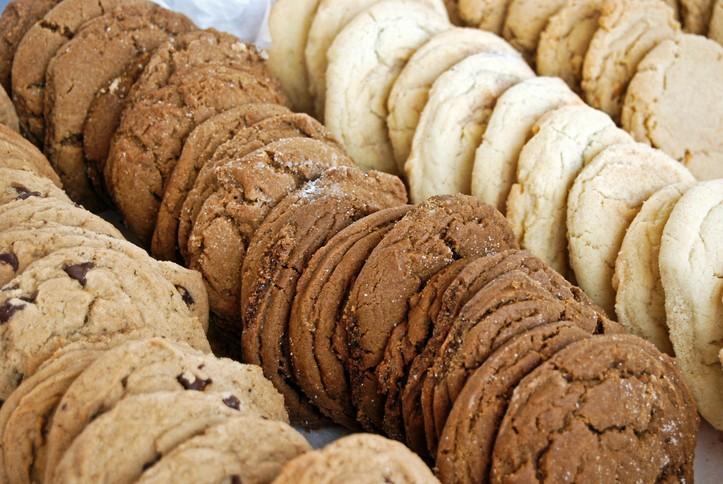 Various kinds of cookies arranged in a row.