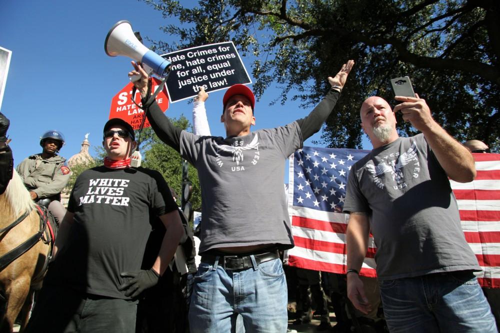 Austin, Texas, USA - November 19, 2016: A group of White Lives Matter demonstrators protest just south of the Capitol grounds. The White Lives Matter demonstrators, numbering about 20 people at the most, came from Houston with the message that the hate crime law is unfair to white people.