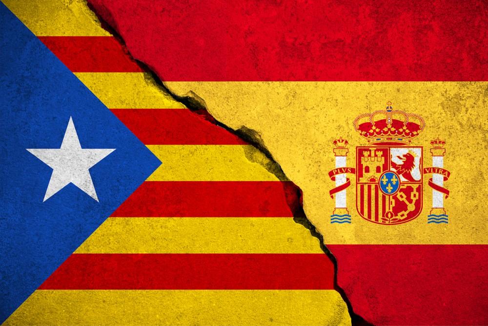 spain flag on broken brick wall and half catalan flag, vote referendum for catalonia independence exit national crisis separatism risk concept